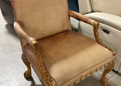 spanish style leather armchair with nailhead detailing image