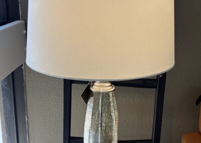 Lamp with mercury glass base and cream barrel shade image