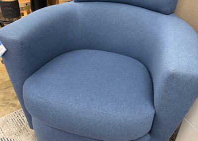 Blue upholstered swivel chair image
