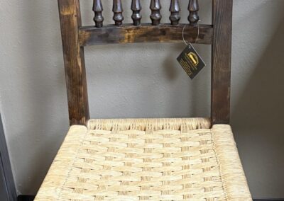 spanish style wood and woven seat dining chair image