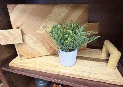 Two cutting boards paired with a fake plant image