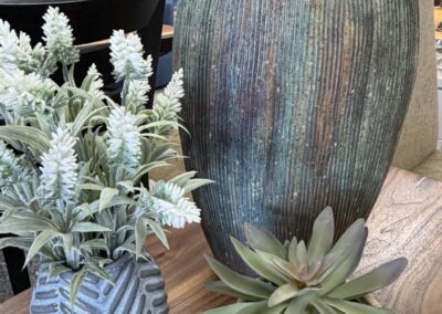 Three ceramic vases, two with silk foliage image