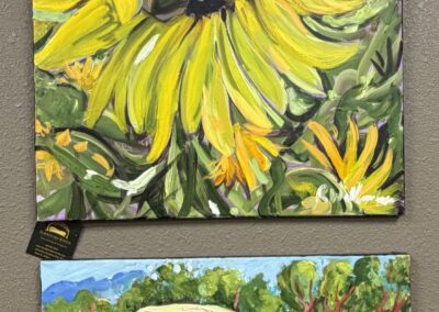 Two oil on canvas paintings. A sunflower and a Yellow Truck image