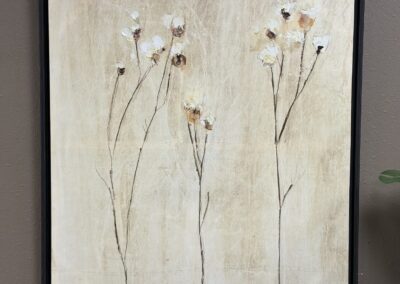 Wall hanging of flowers with black frame image