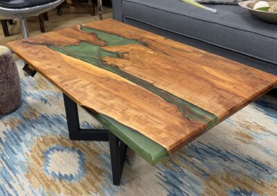 Epoxy and wood coffee table with crossed metal base image